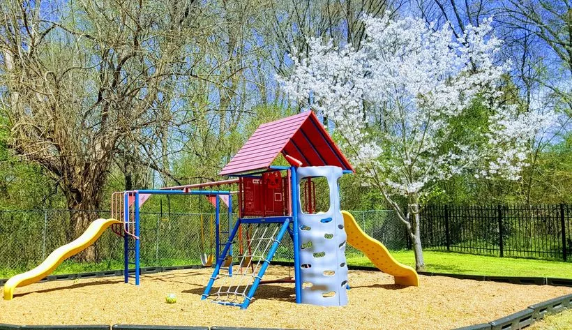 A beautiful spring day at the Fayette Cares shelter playground