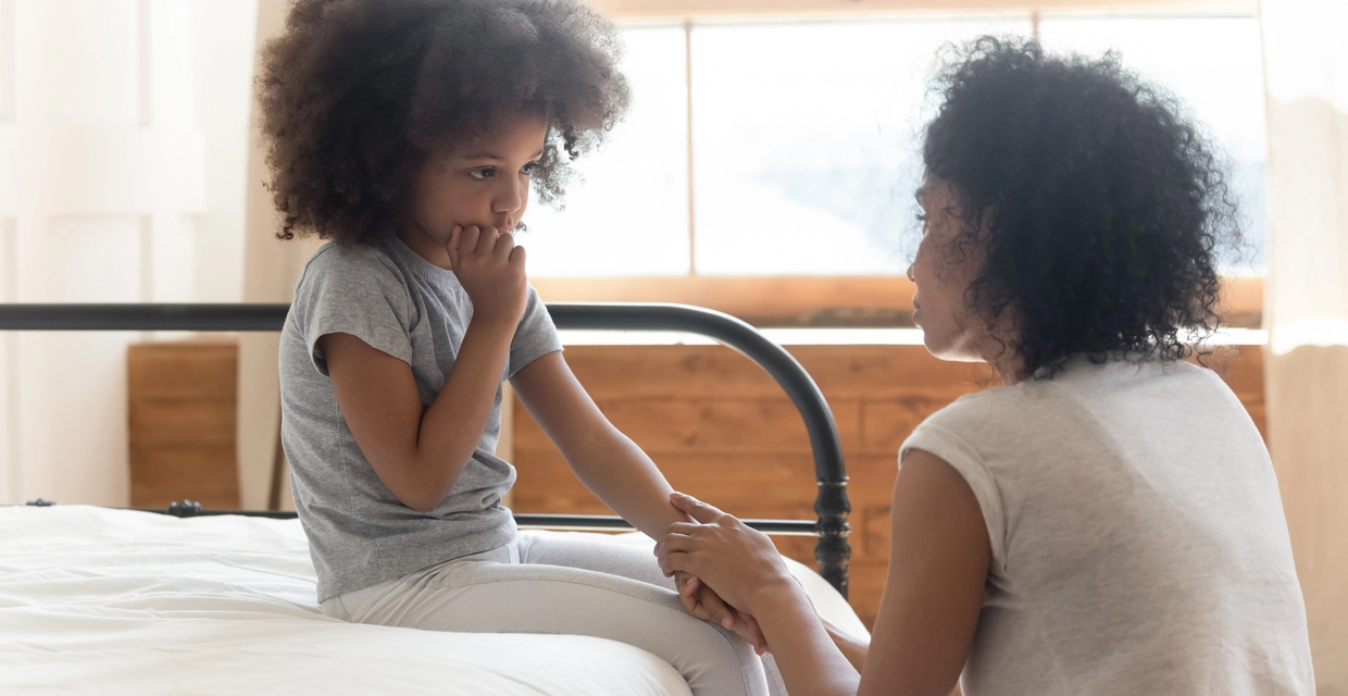 Parents talk to kids about divorce after domestic violence.